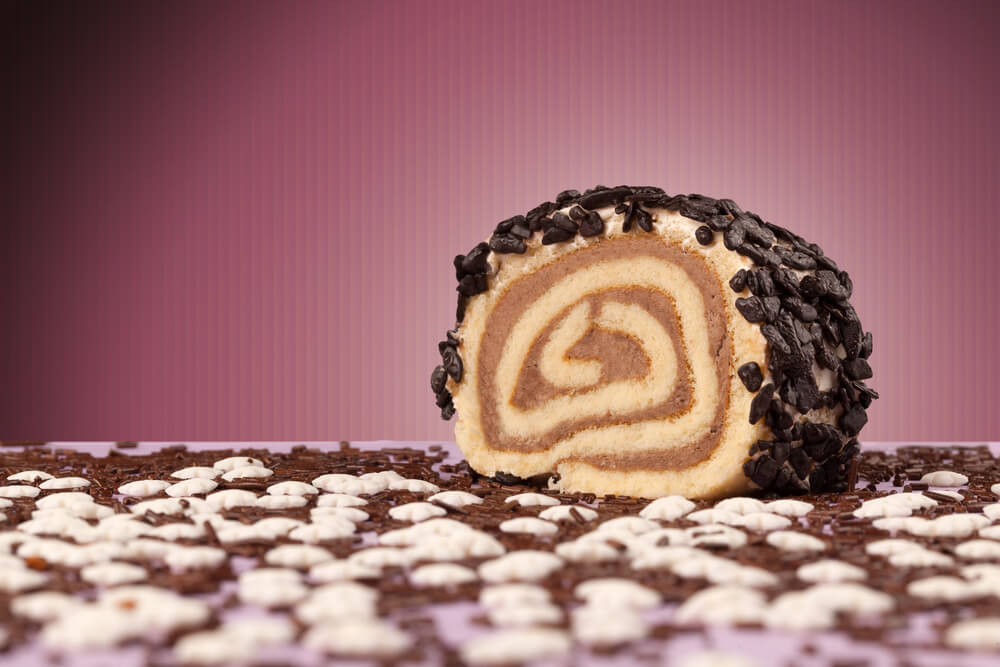 Close up of a delicious cake on colorful background with copyspace